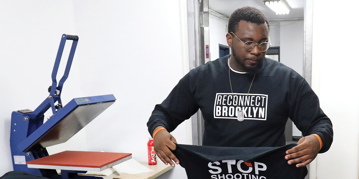 A volunteer works at Reconnect Brooklyn