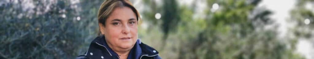 The mother of St. Carlo Acutis looks at the camera