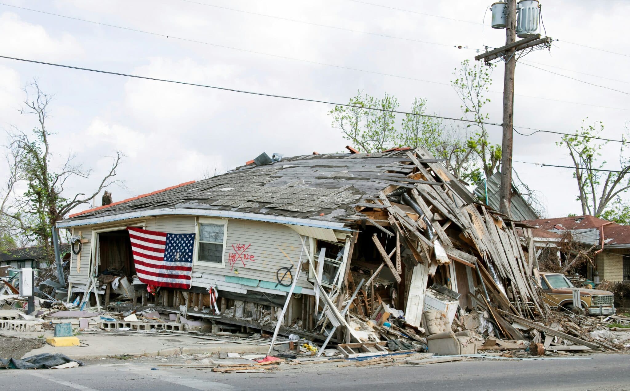 House destroyed by Hurricane Katrina in New Orleans | Photo by Library of Congress on Unsplash