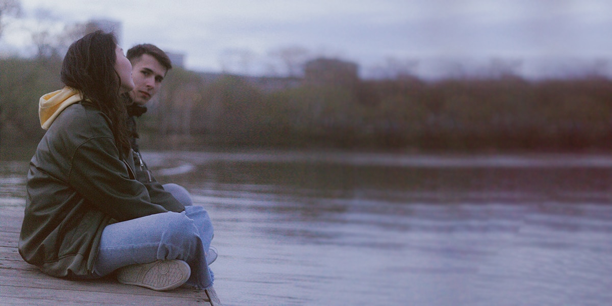 couple sitting, talking, listening, being present