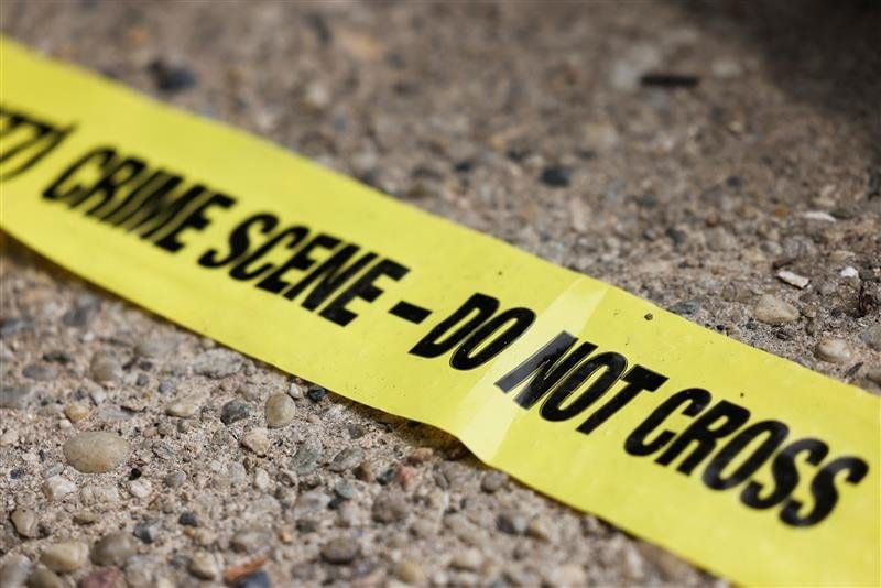 Crime scene tape is seen in this illustration photo.