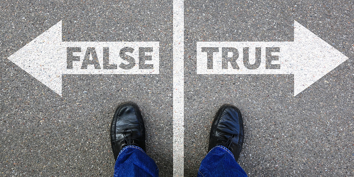 two feet standing on a line with arrows going to the left and right for true and false