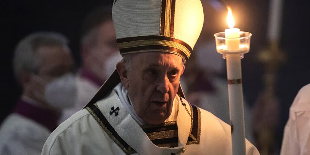 Pope Francis leads a procession at Mass.