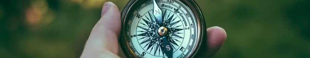 Man holding a compass