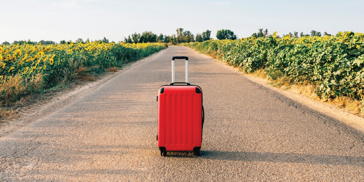 luggage on a road