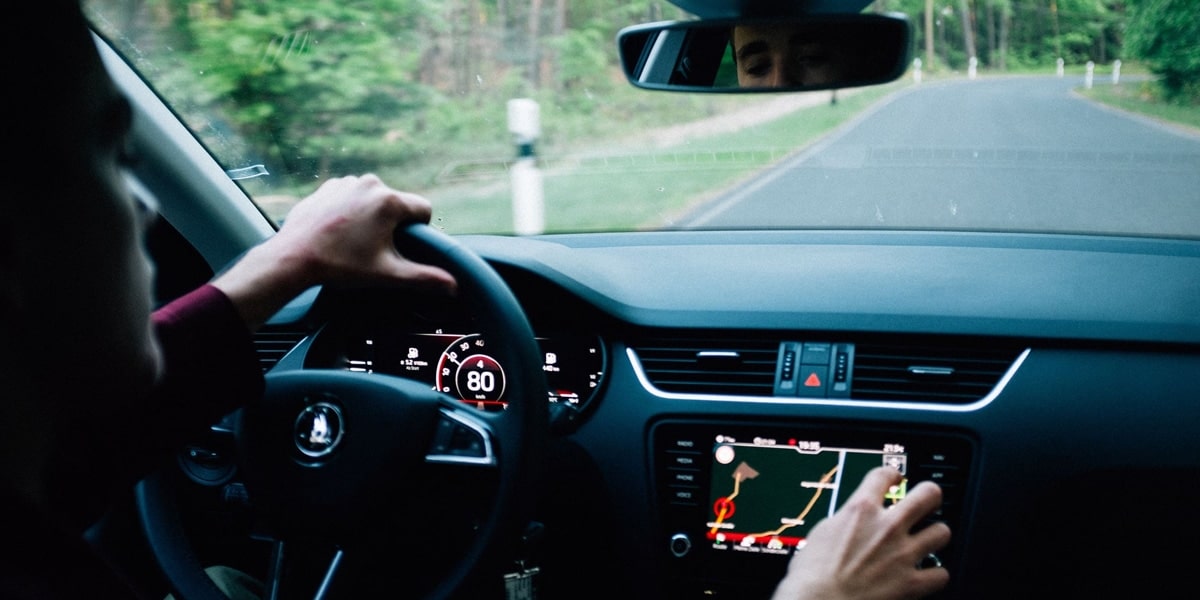 man driving in a car