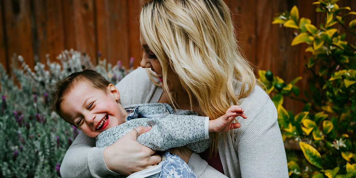 A mom enjoying time with her child.