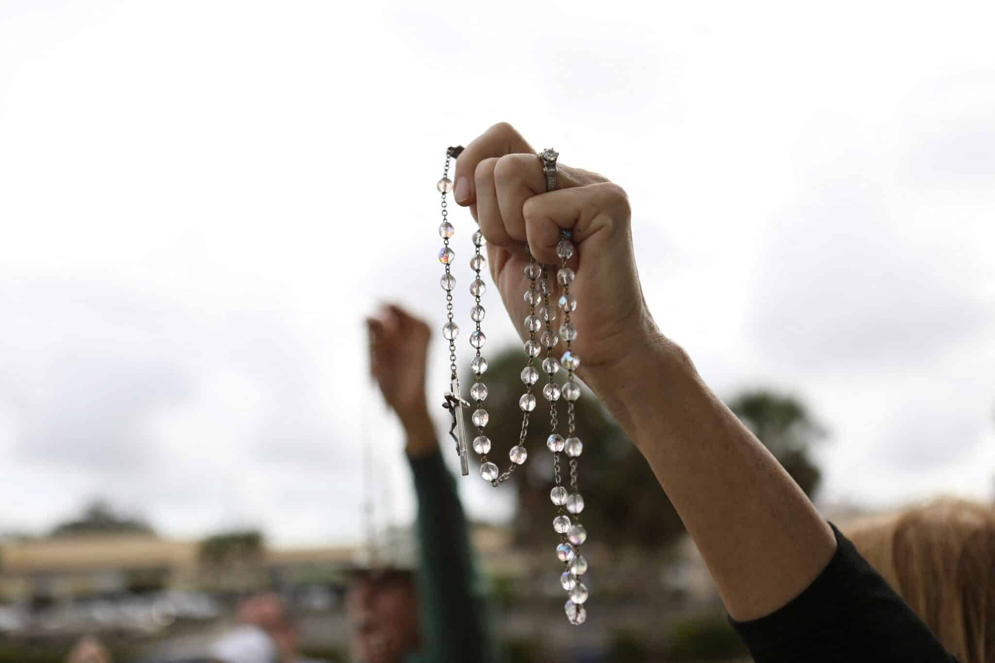 Catholic pro-life activists pray Feb. 11, 2023, outside of Bread and Roses Woman's Health Center, a Clearwater, Fla., clinic that provides abortions. A new annual report by the U.S. Conference of Catholic Bishops issued Jan. 16, 2025, identified what it called five areas of critical concern, defined as both threats and opportunities, for religious liberty. (OSV News photo/Octavio Jones, Reuters)