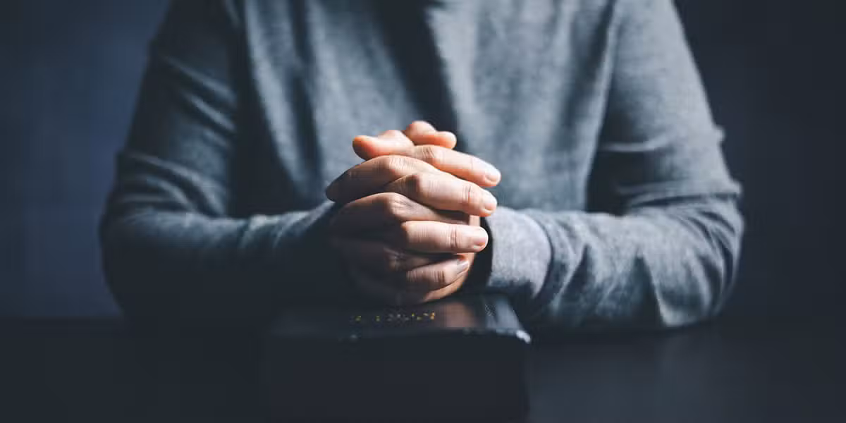 hands folded in prayer