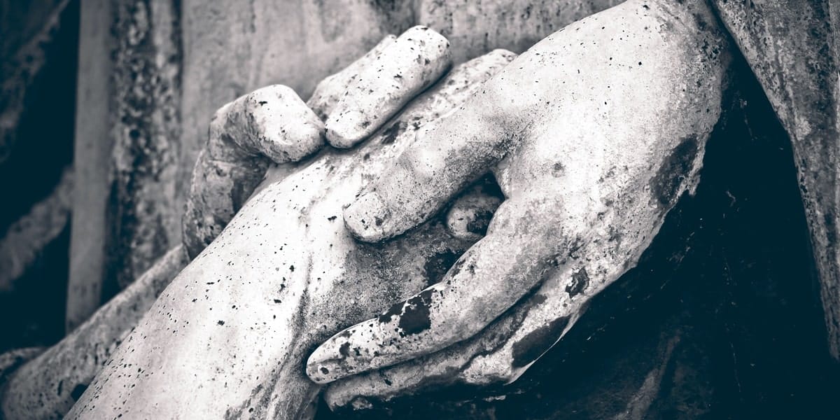 hands clutched together