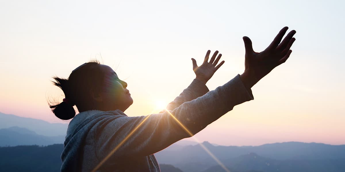 woman worshipping and praying