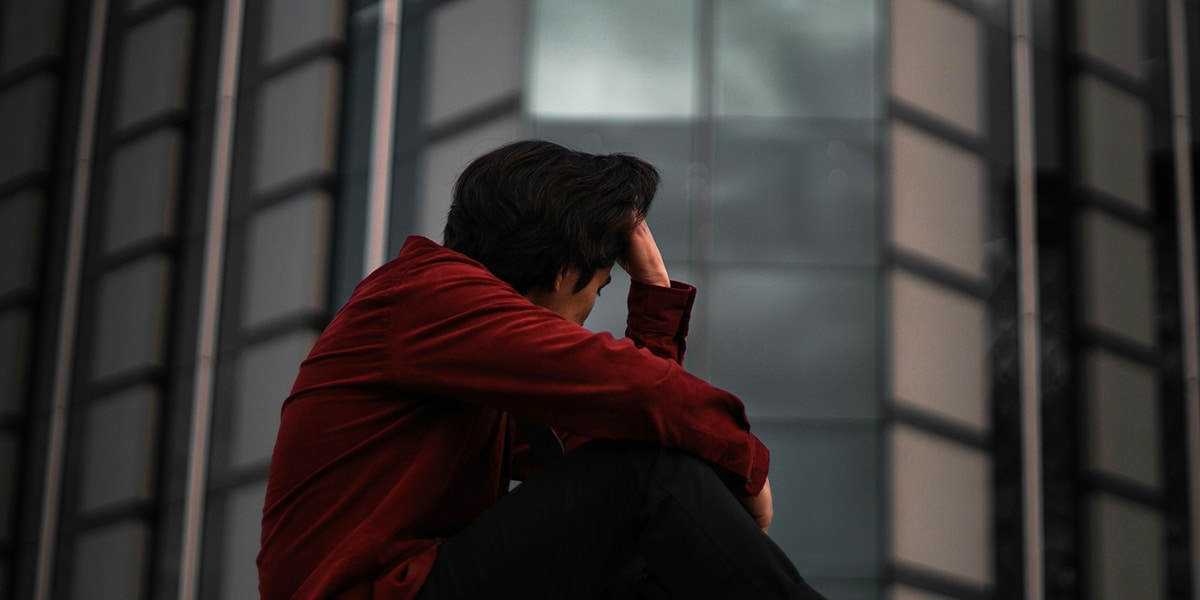Young man, sad and grieving