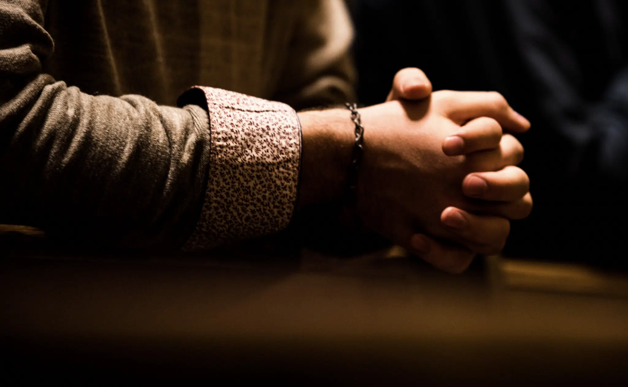 hands closed in prayer